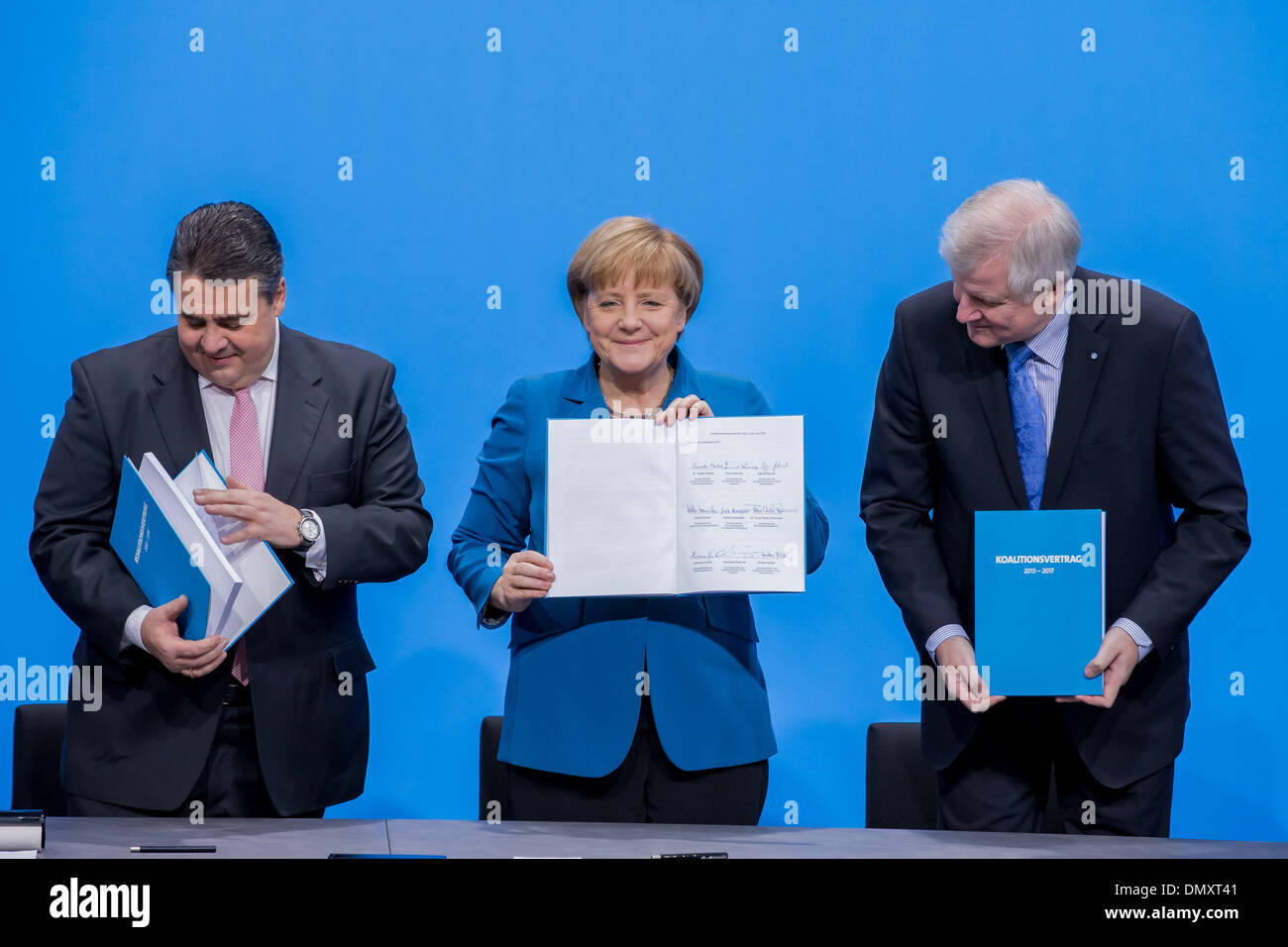 Dec. 16, 2013 - Merkel, CDU Chairman, Seehofer, CSU chairman and Gabriel, SPD Chairman sign the coalition agreement at Paul LÃƒÂ¶be Haus in Berlin. / Picture: Sigmar Gabriel (SPD), SPD Chairman, Angela Merkel, German Chancellor, and Horst Seehofer (CSU), CSU chairman and Minister-President of Bavaria, in Berlin, on December 17, 2013.Photo: Reynaldo Paganelli/NurPhoto (Credit Image: © Reynaldo Paganelli/NurPhoto/ZUMAPRESS.com) Stock Photo