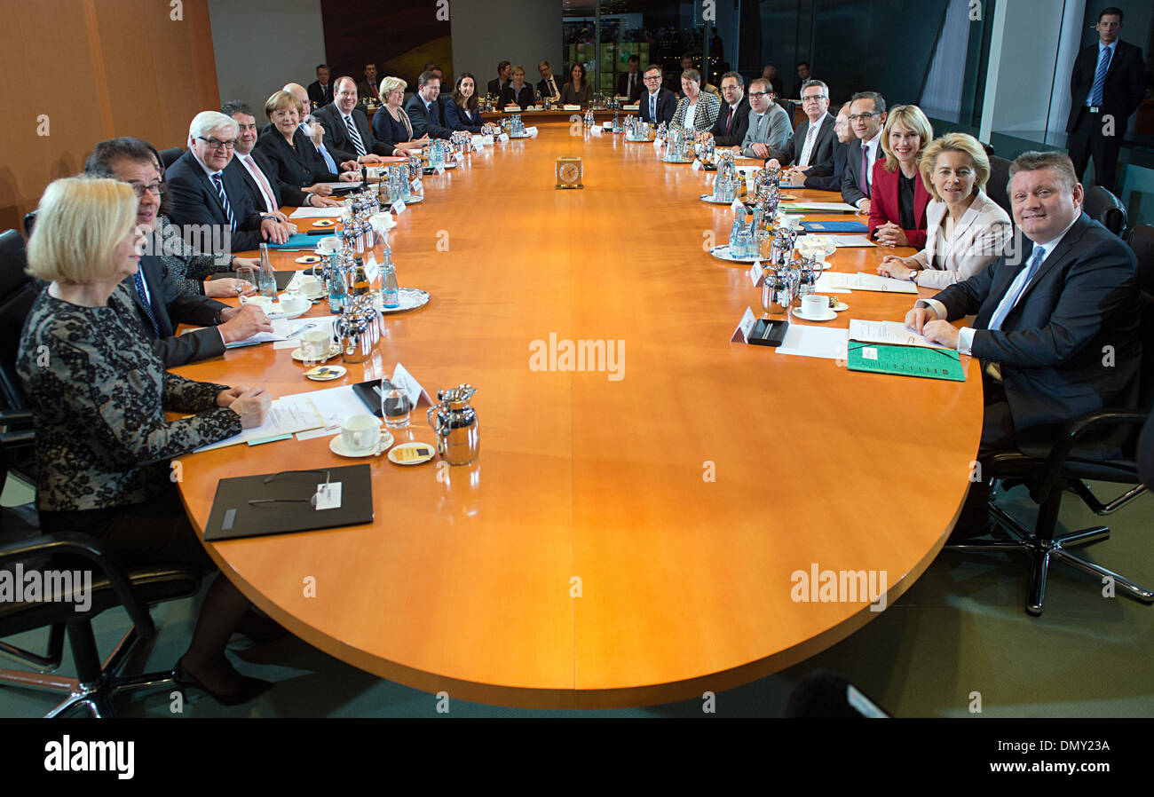 Berlin, Germany. 17th Dec, 2013. The German Ministers and the Chancellor sit at the cabinet table in the cabinet hall in Berlin, Germany, 17 December 2013. The new cabinet of the Grand Coalition came together forthe first time. Credit:  dpa picture alliance/Alamy Live News Stock Photo