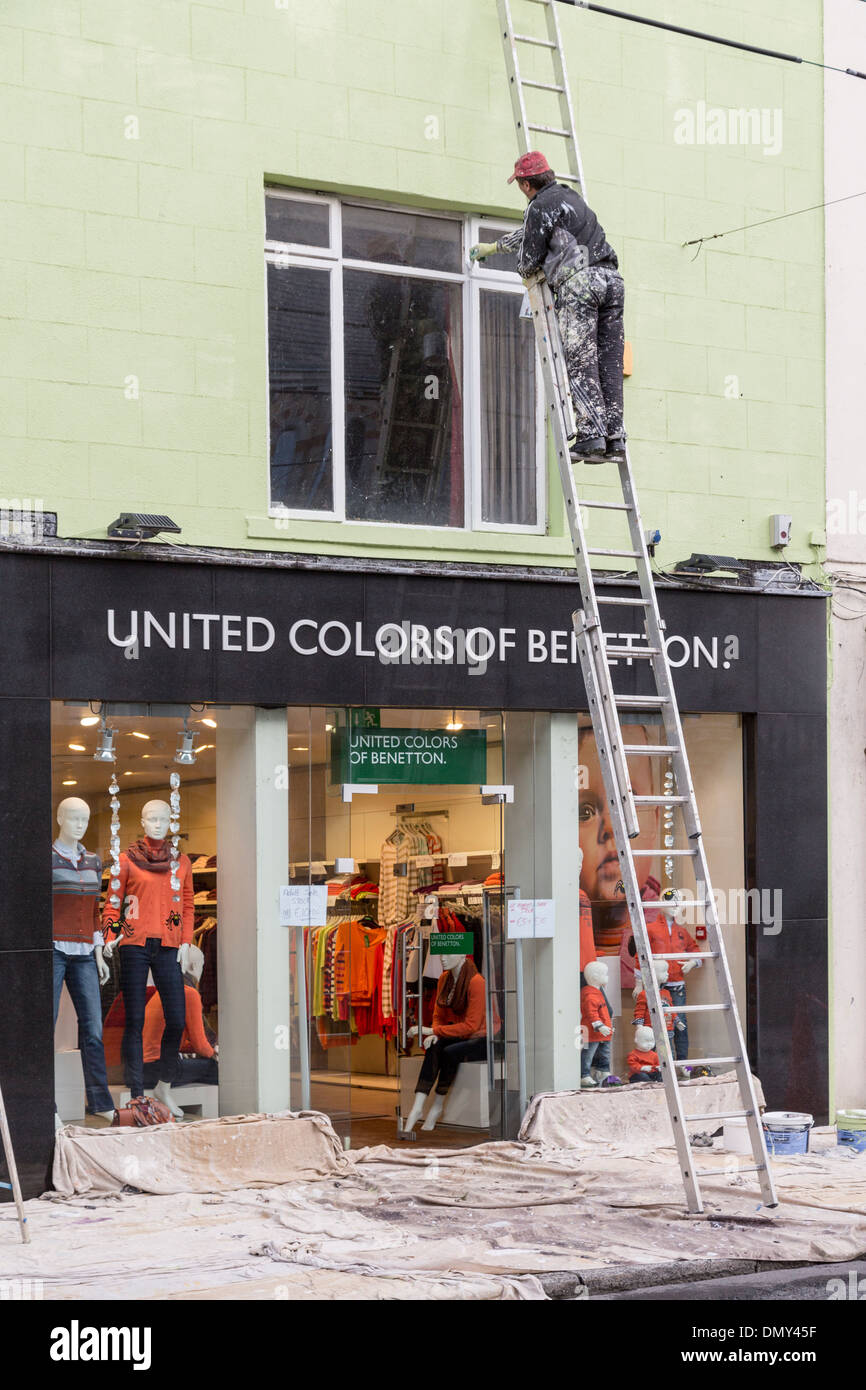 Main painting window of United Colors of Benetton shop, Clonmel, Ireland Stock Photo