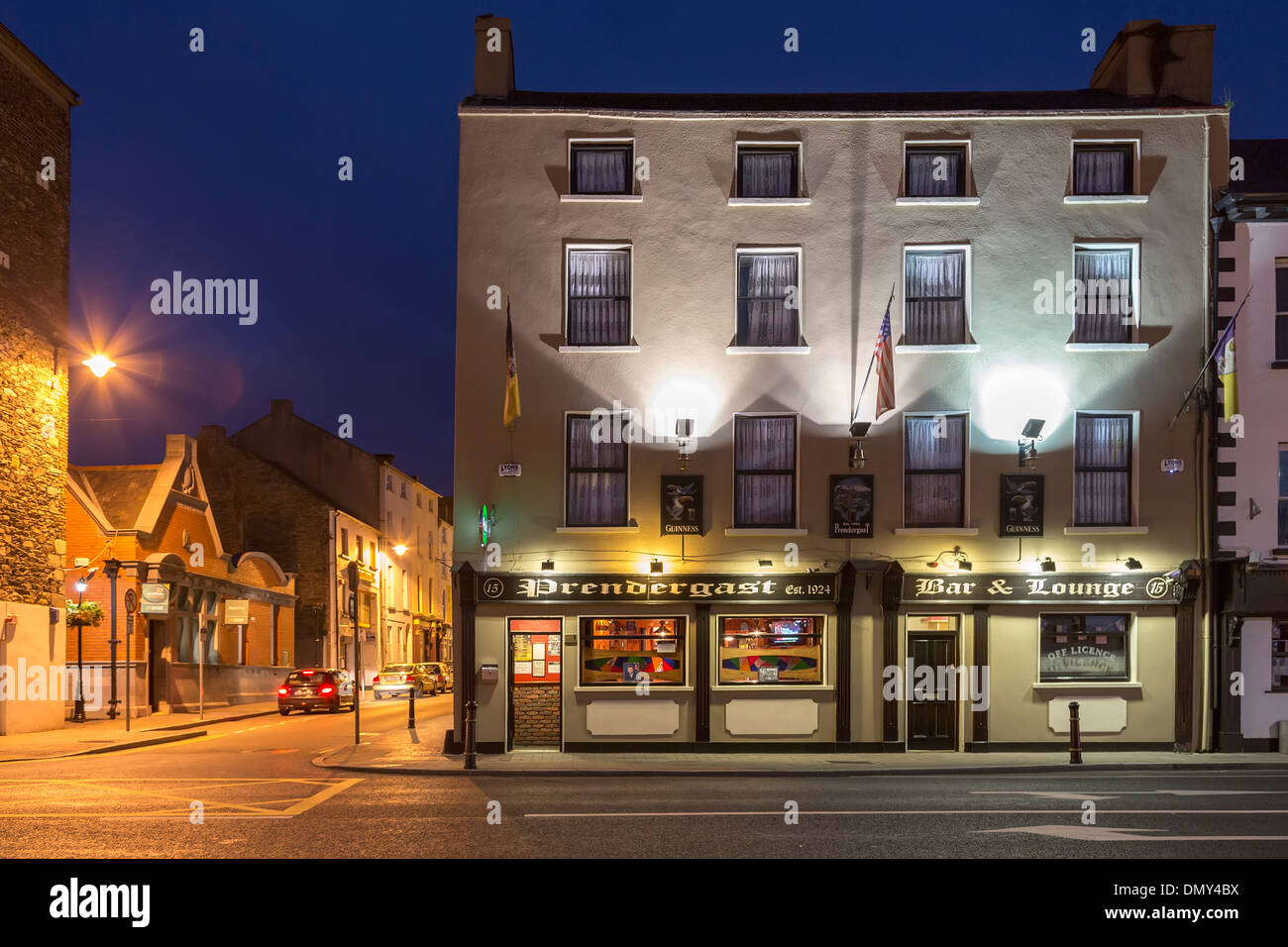 Public house on main street of New Ross at dusk, Ireland Stock Photo