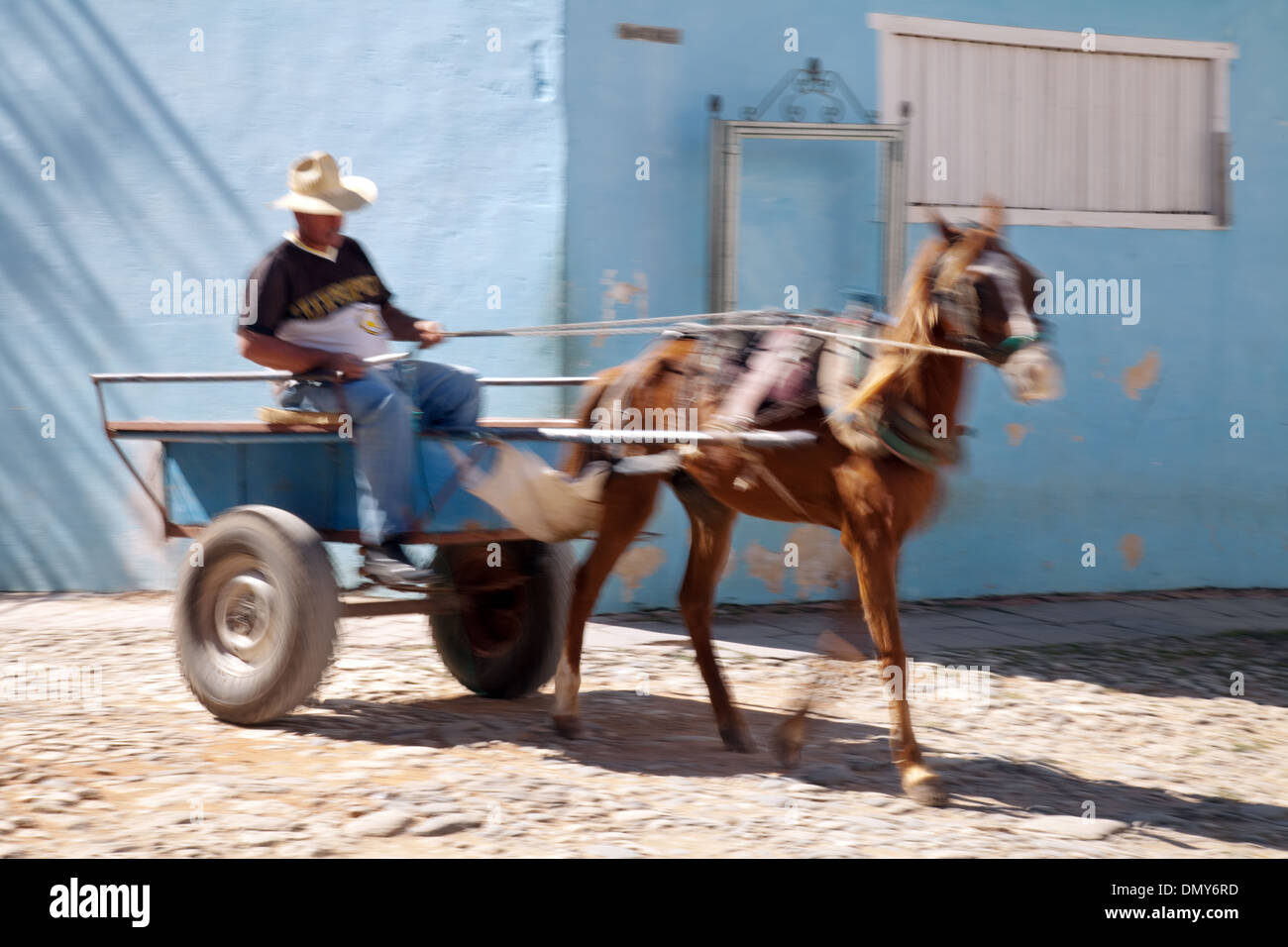 Cuban lifestyle; Trinidad, Cuba, horse and cart transport with motion blur, Cuba, Caribbean Stock Photo
