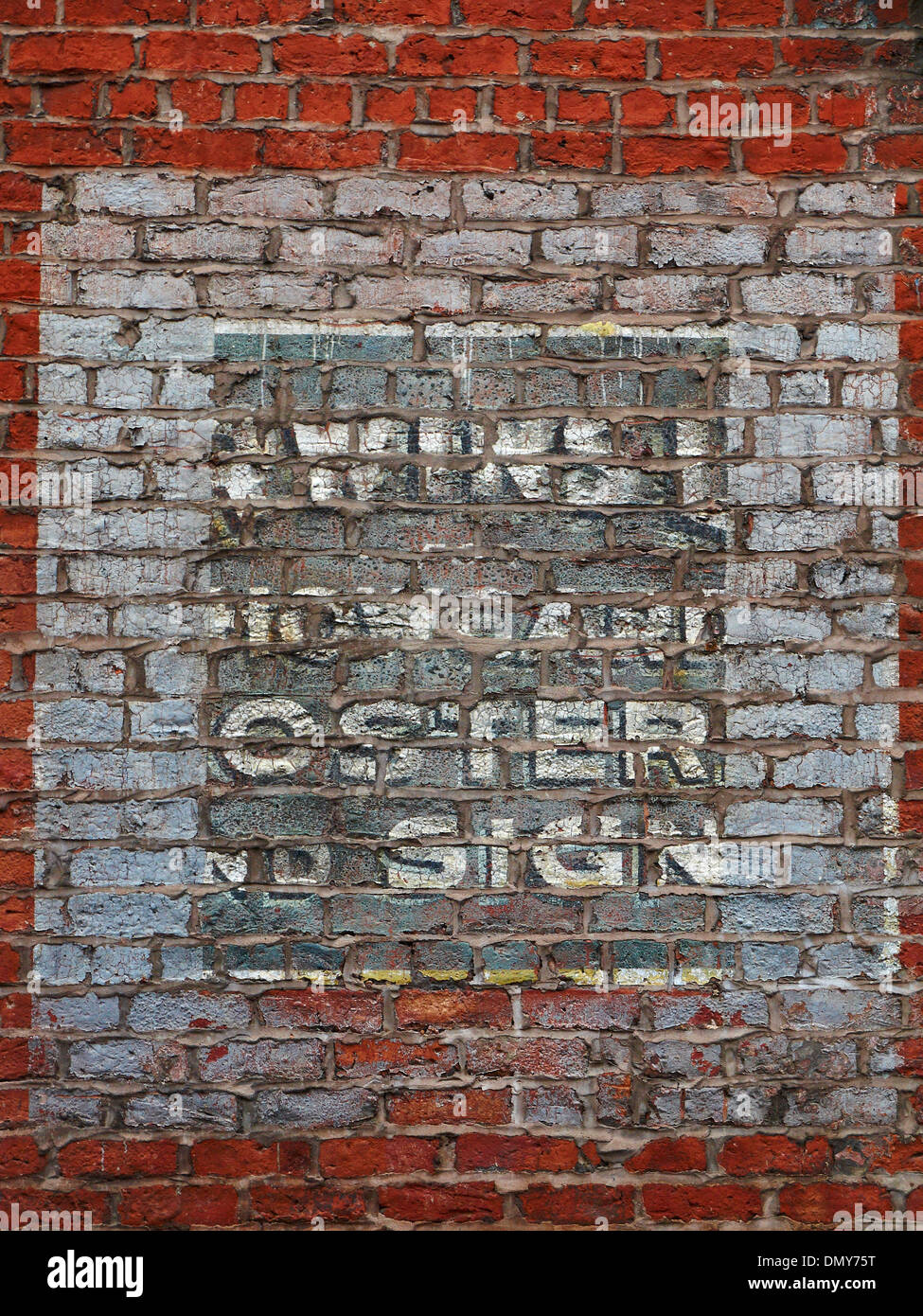 Old fading advert on outside wall in Northern Quarter Manchester UK Stock Photo