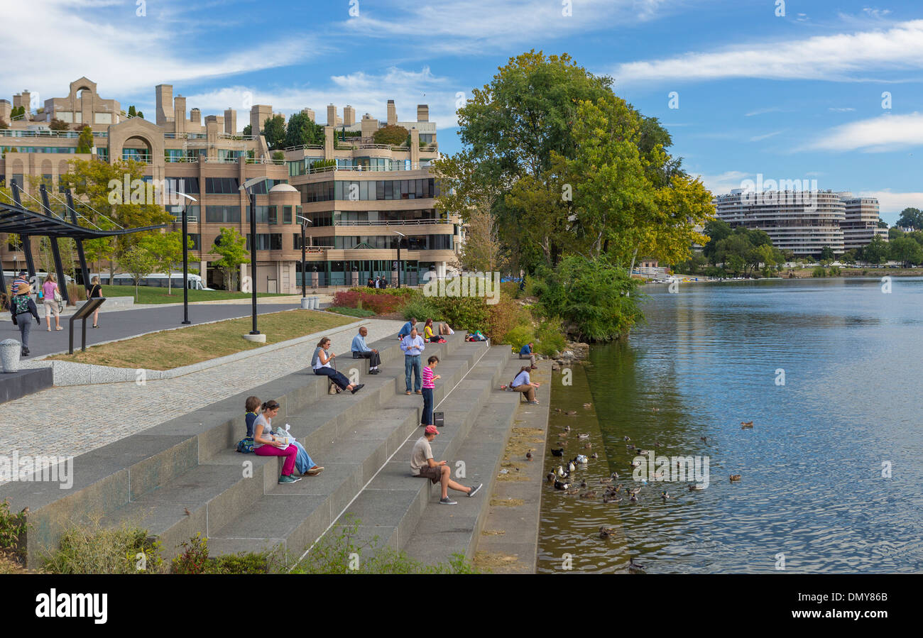 WASHINGTON, DC, USA People on steps by Potomac RIver in Waterfront Park Stock Photo