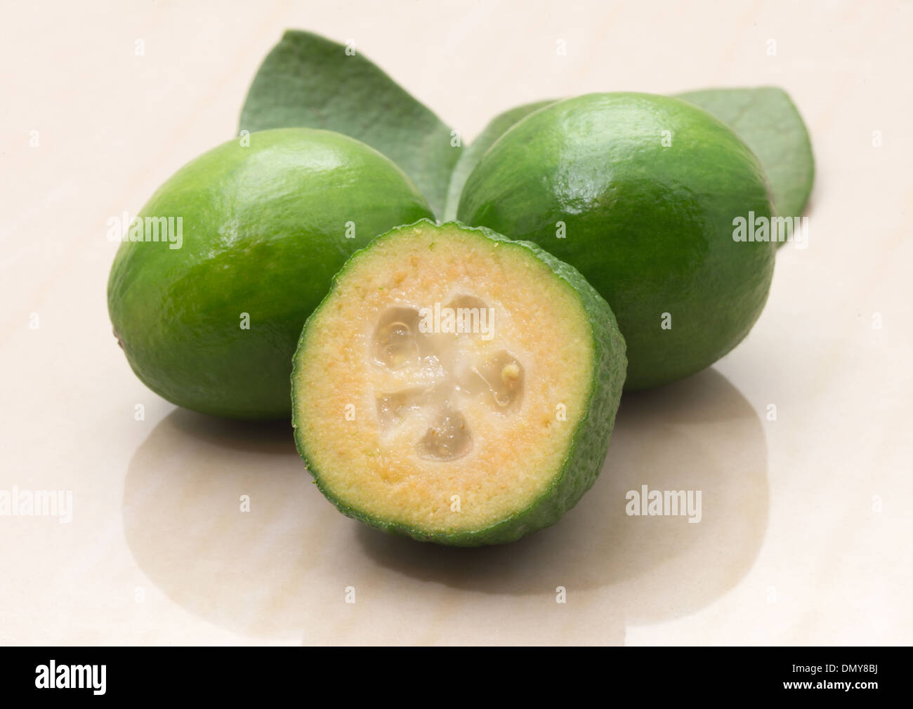pineapple guava or feijoa fruit and leaves on a marble table Stock Photo Alamy