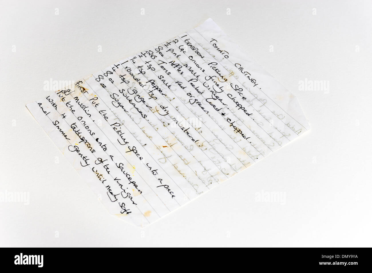 Hand written recipe for Tomato Chutney on white background Stock Photo
