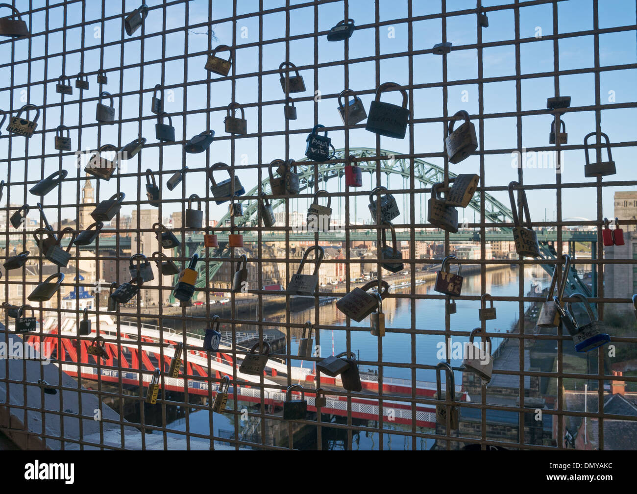 Love locks on Newcastle high level bridge with Tyne bridges in the