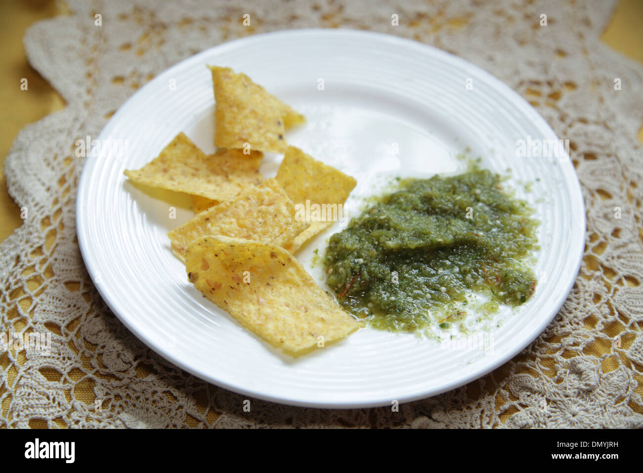 Salsa Verde with Tortilla Chips Stock Photo