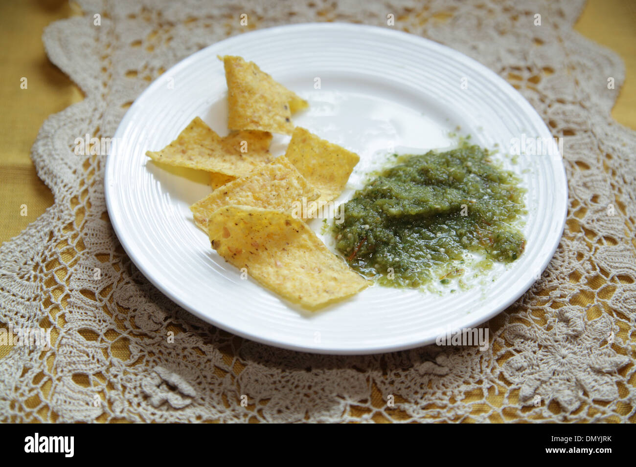 Salsa Verde with Tortilla Chips Stock Photo