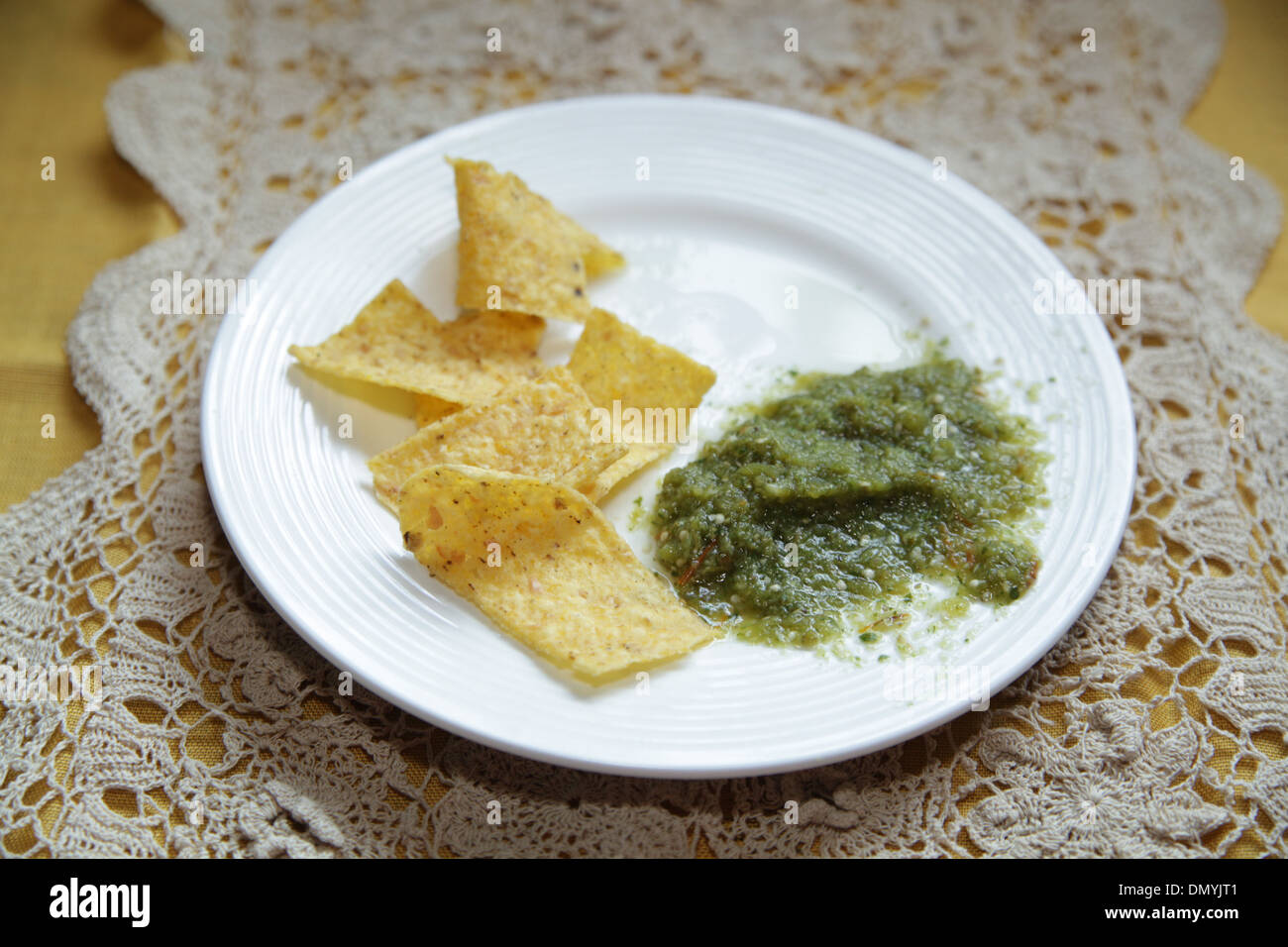 Salsa Verde with Tortilla Chips Stock Photo