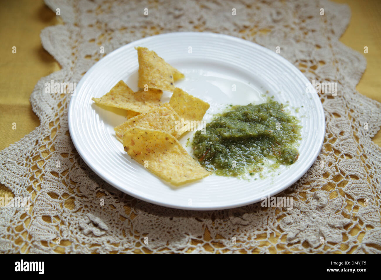 Salsa Verde with Tortilla Chips Stock Photo