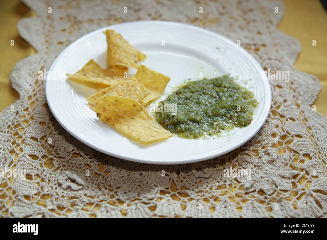 Salsa Verde with Tortilla Chips Stock Photo
