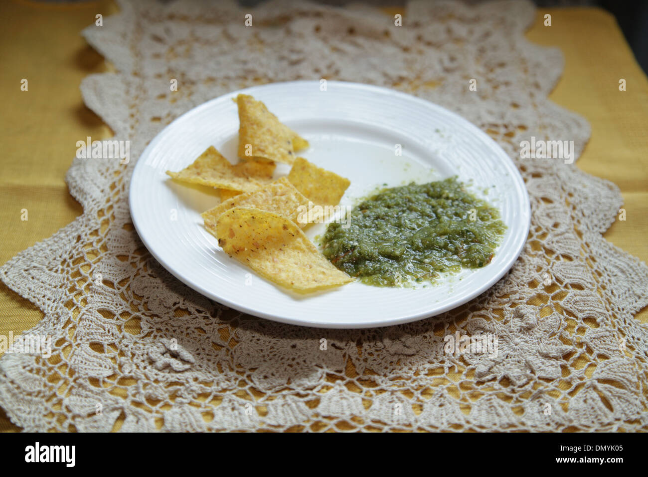 Salsa Verde with Tortilla Chips Stock Photo