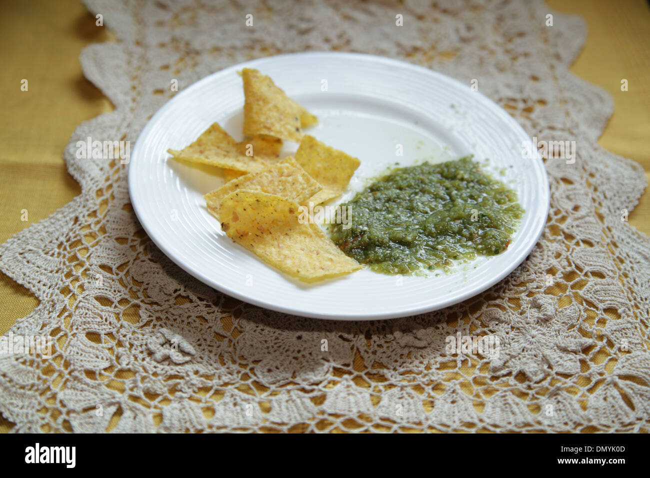 Salsa Verde with Tortilla Chips Stock Photo