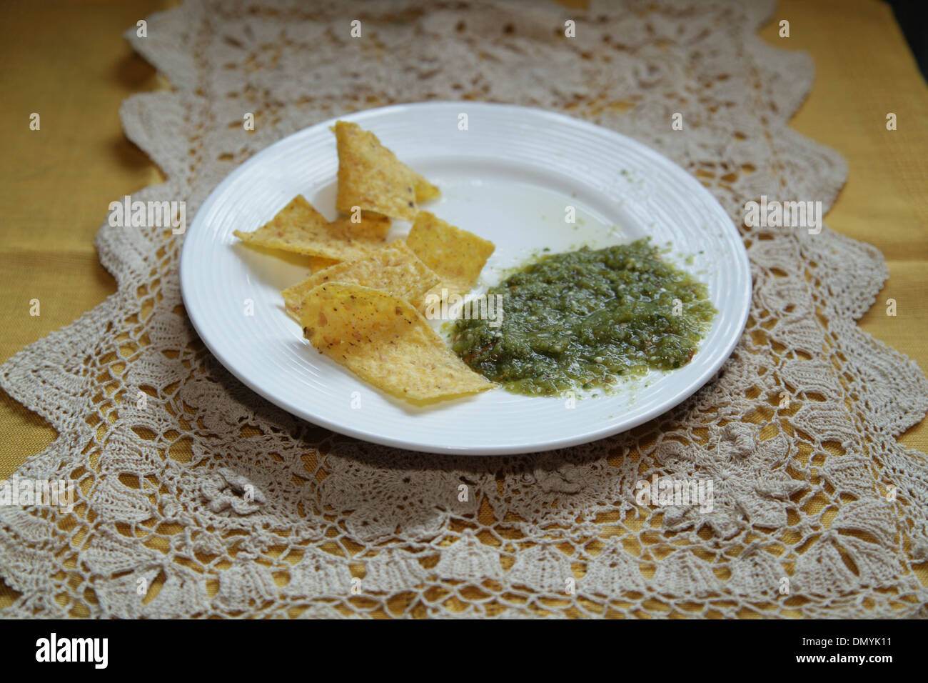Salsa Verde with Tortilla Chips Stock Photo