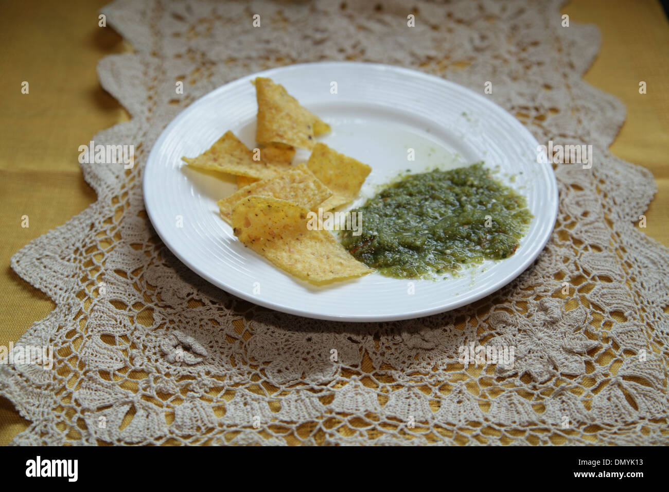Salsa Verde with Tortilla Chips Stock Photo