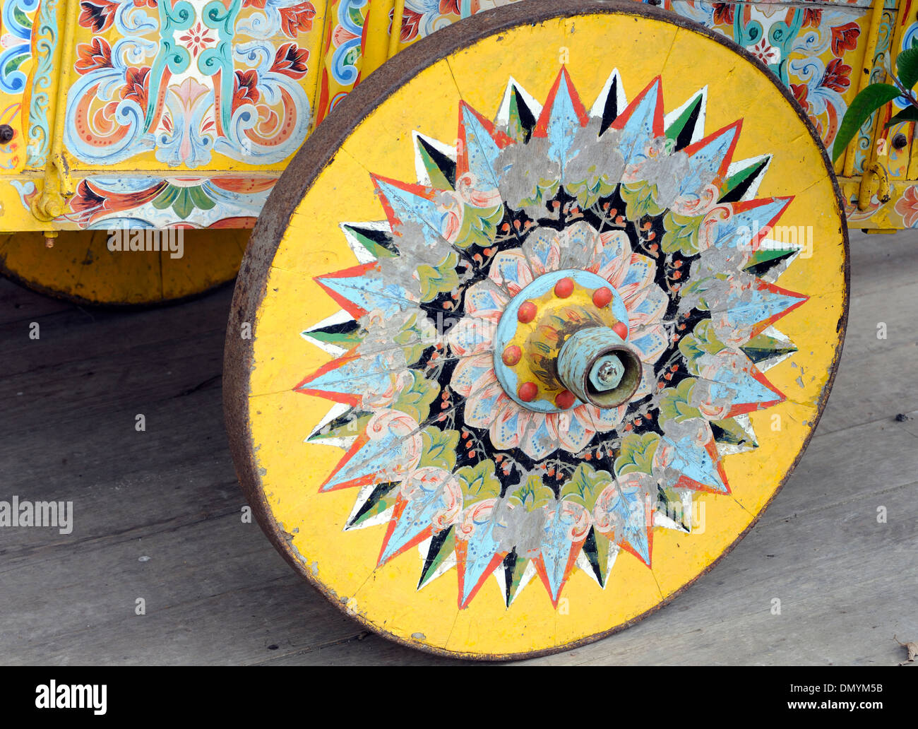 Solid wooden wheel of a traditional Costa Rican decorated ox cart, carreta. Santa Elena, Costa Rica. Stock Photo