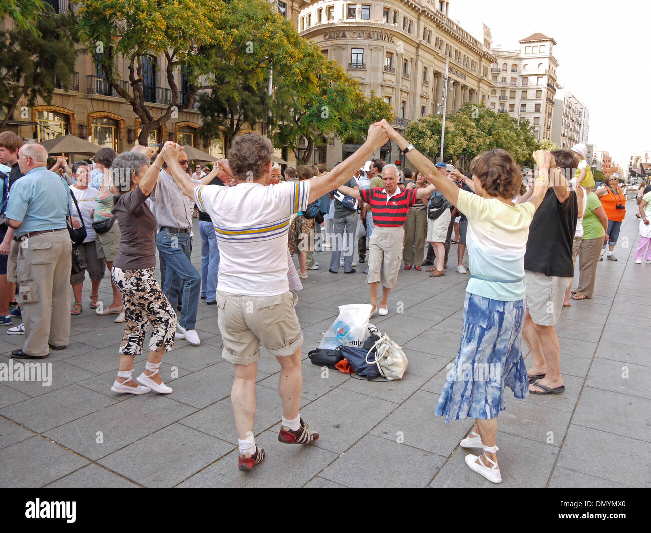 People dancing the traditional circle dance, the sardana, in Barcelona, Spain Stock Photo
