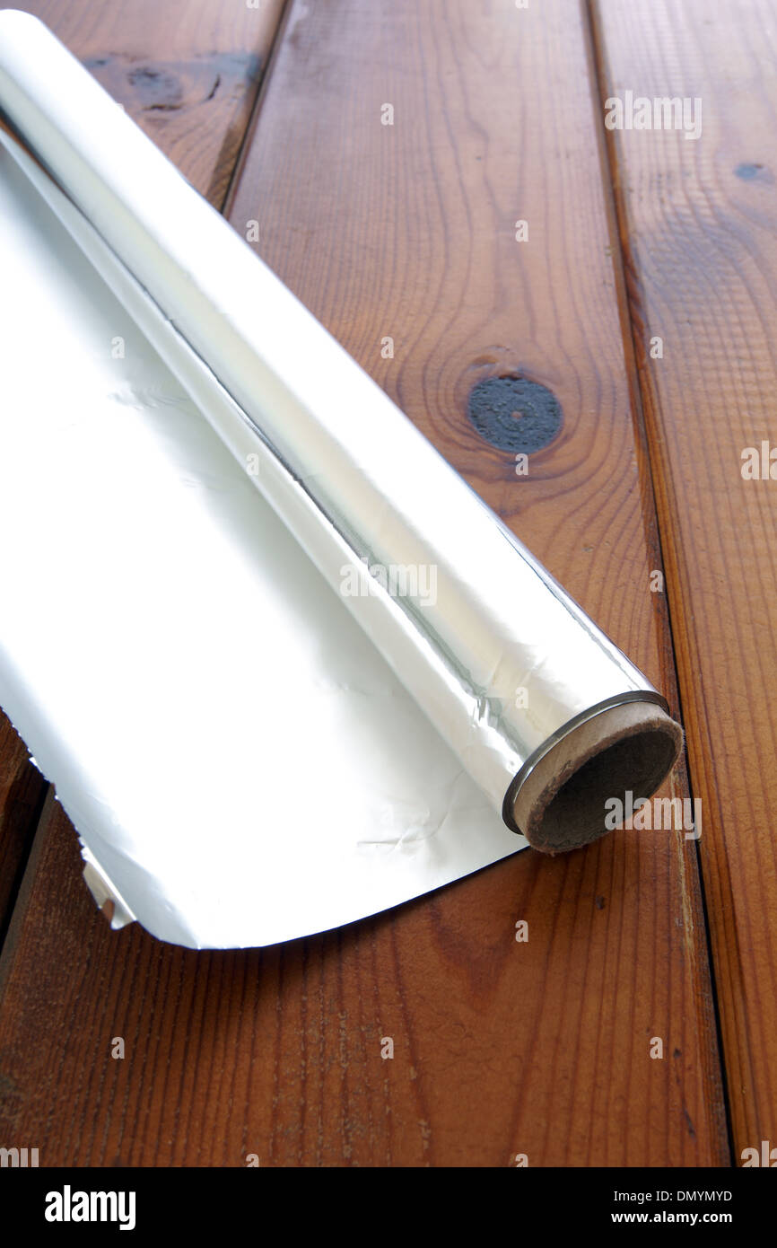 Roll of kitchen or aluminum foil Stock Photo Alamy