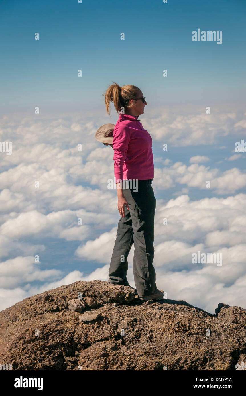 Gazing over the clouds above the African plains from the slopes of Kilimanjaro Stock Photo