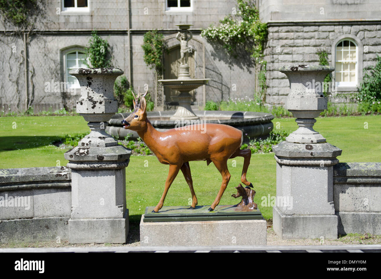 balmoral castle with deer sculpture in garden Stock Photo