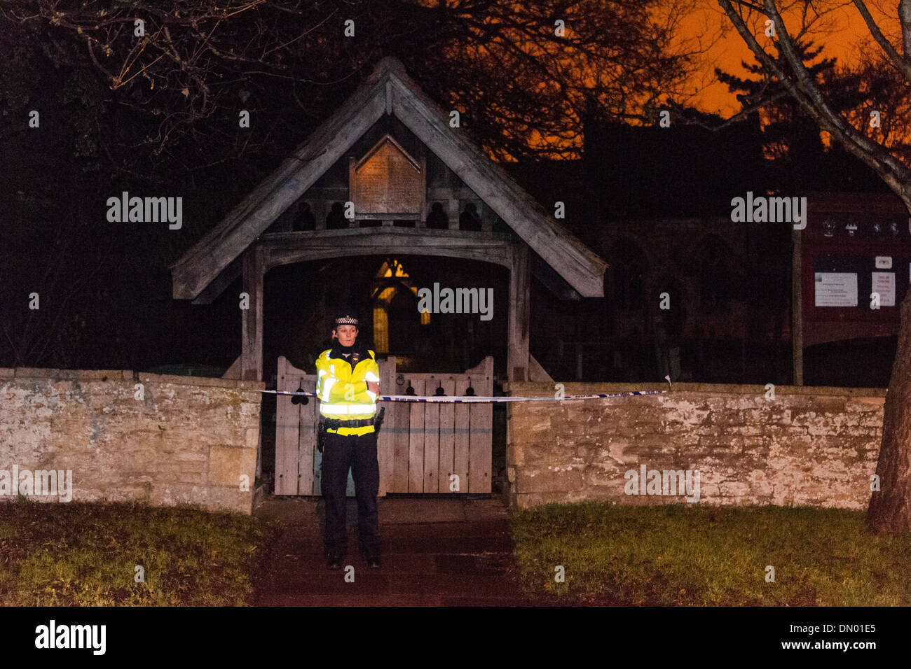 Didcot, UK. 17th Dec, 2013. Police officer stand guard at entrance to All Saints Church and Graveyard, Didcot, Oxfordshire while they continue to search for missing teenager Jayden Parkinson on Tuesday 17 December 2013 Credit:  Nikreates/Alamy Live News Stock Photo