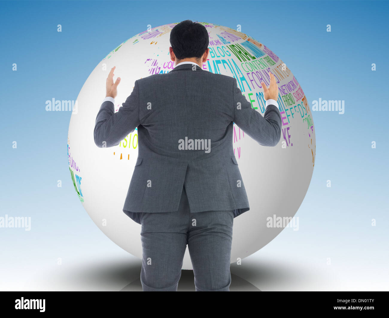 Composite image of businessman with arms raised Stock Photo - Alamy