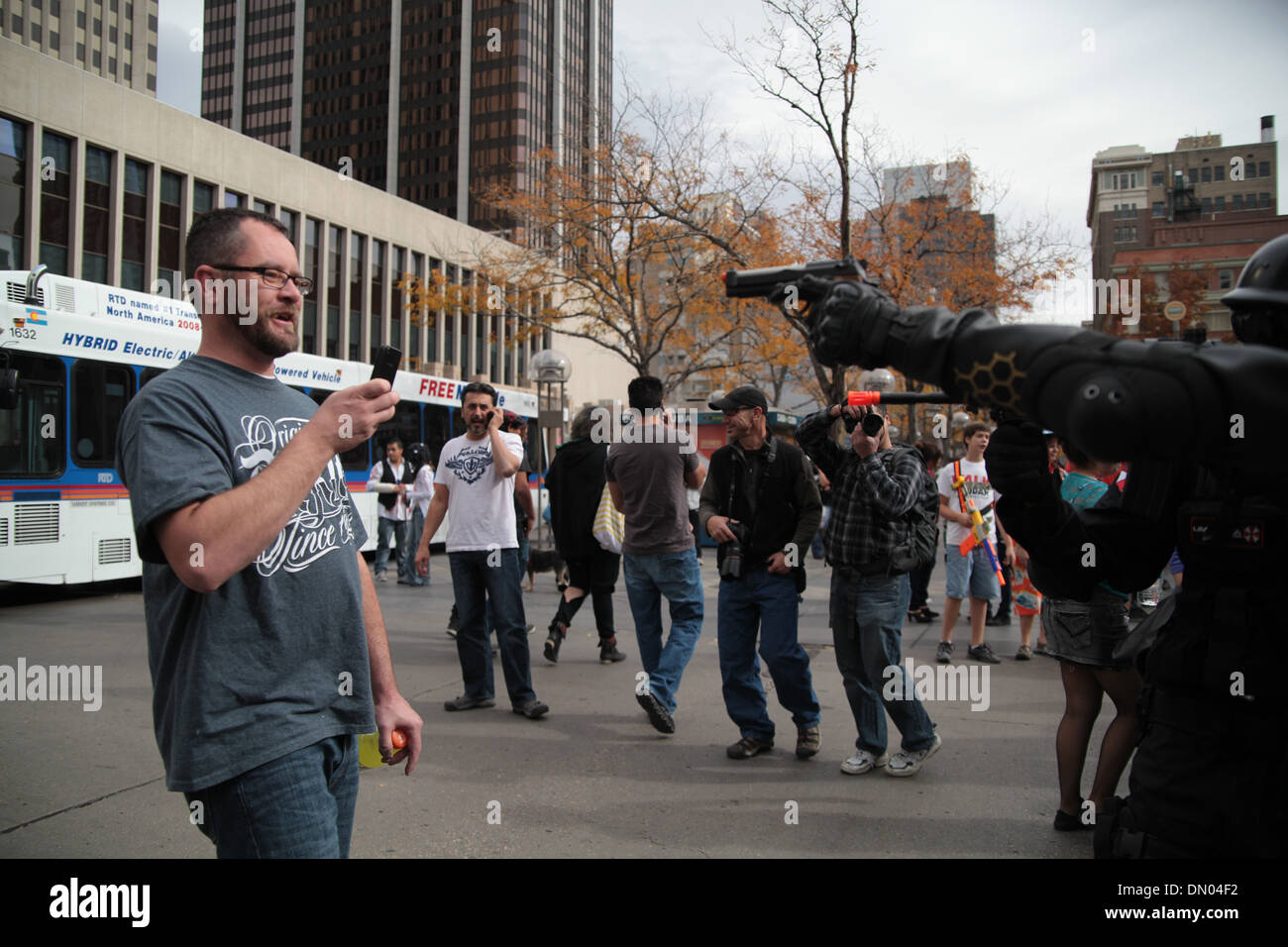Man talking photo on cellphone of a zombie killer Stock Photo