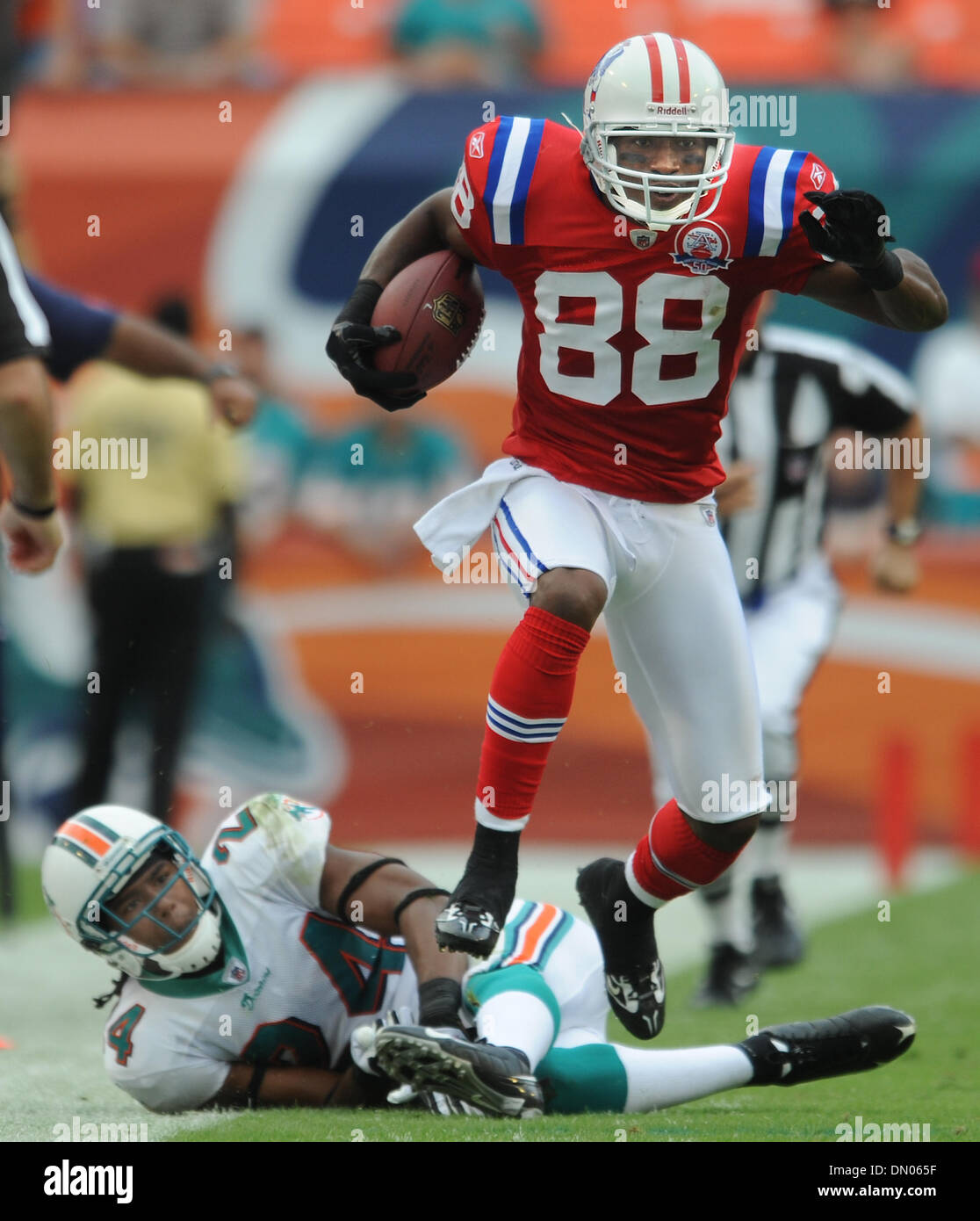 Dec. 06, 2009 - Miami Gardens, Florida, USA - Dolphins-pats-JR120609. Sam Aiken of the Patriots breaks free from the tackle of Sean Smith and runs for an 81 yard touchdown in the third quarter. 12/6/09. Sun Sentinel, Jim Rassol  (Credit Image: © Sun-Sentinel/ZUMApress.com) Stock Photo