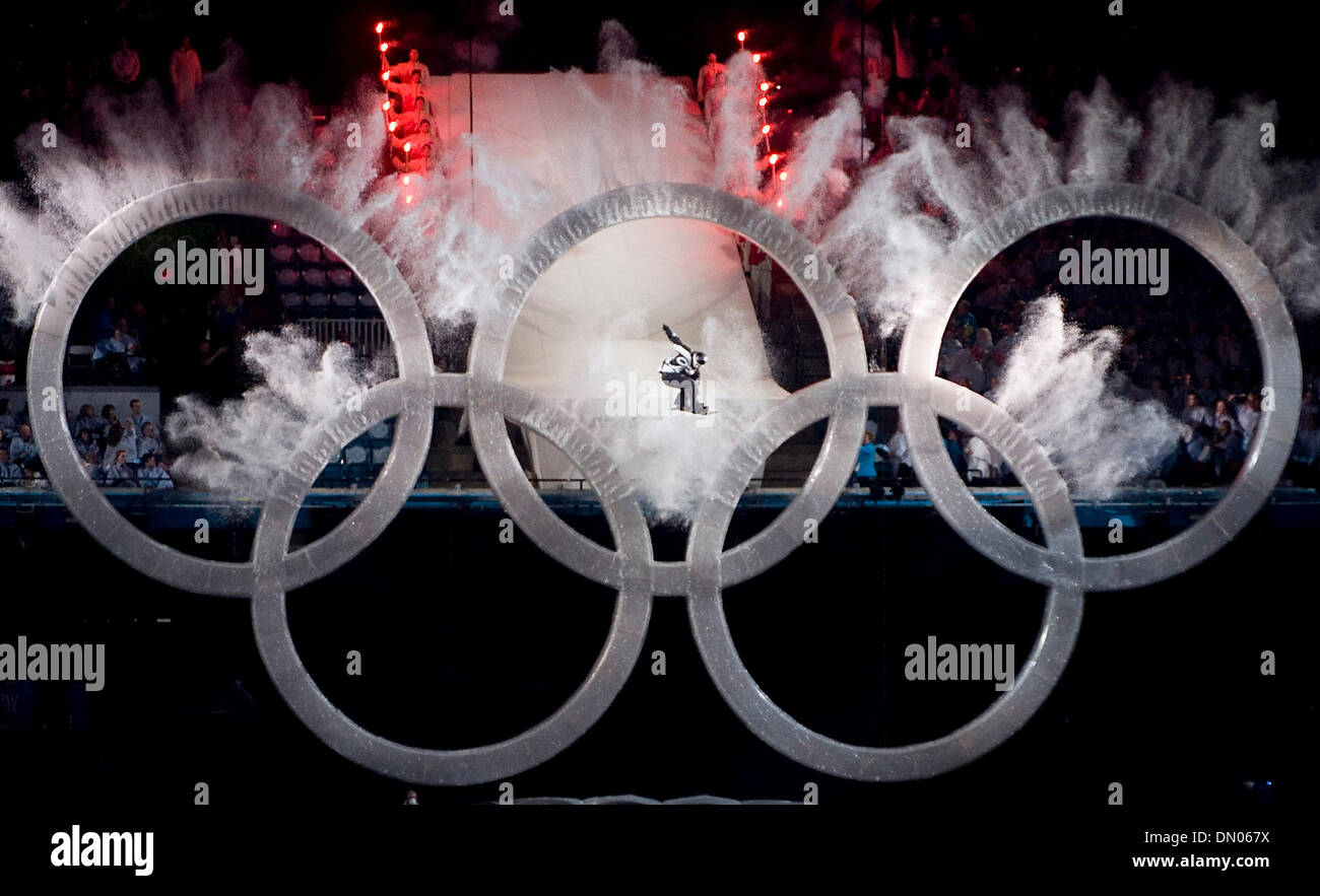 Feb. 12, 2010 - Vancouver, British Columbia, Canada - OLYMPICS OPENING CEREMONY -  Snowboarder flies though the center rings of the Olympics circle during the Fire on the Mountain program at the XXI Winter Olympic opening ceremonies at the BC Palace on Friday February 12, 2010 in Vancouver, British Columbia. (Credit Image: © Paul Kitagaki Jr./ZUMApress.com) Stock Photo