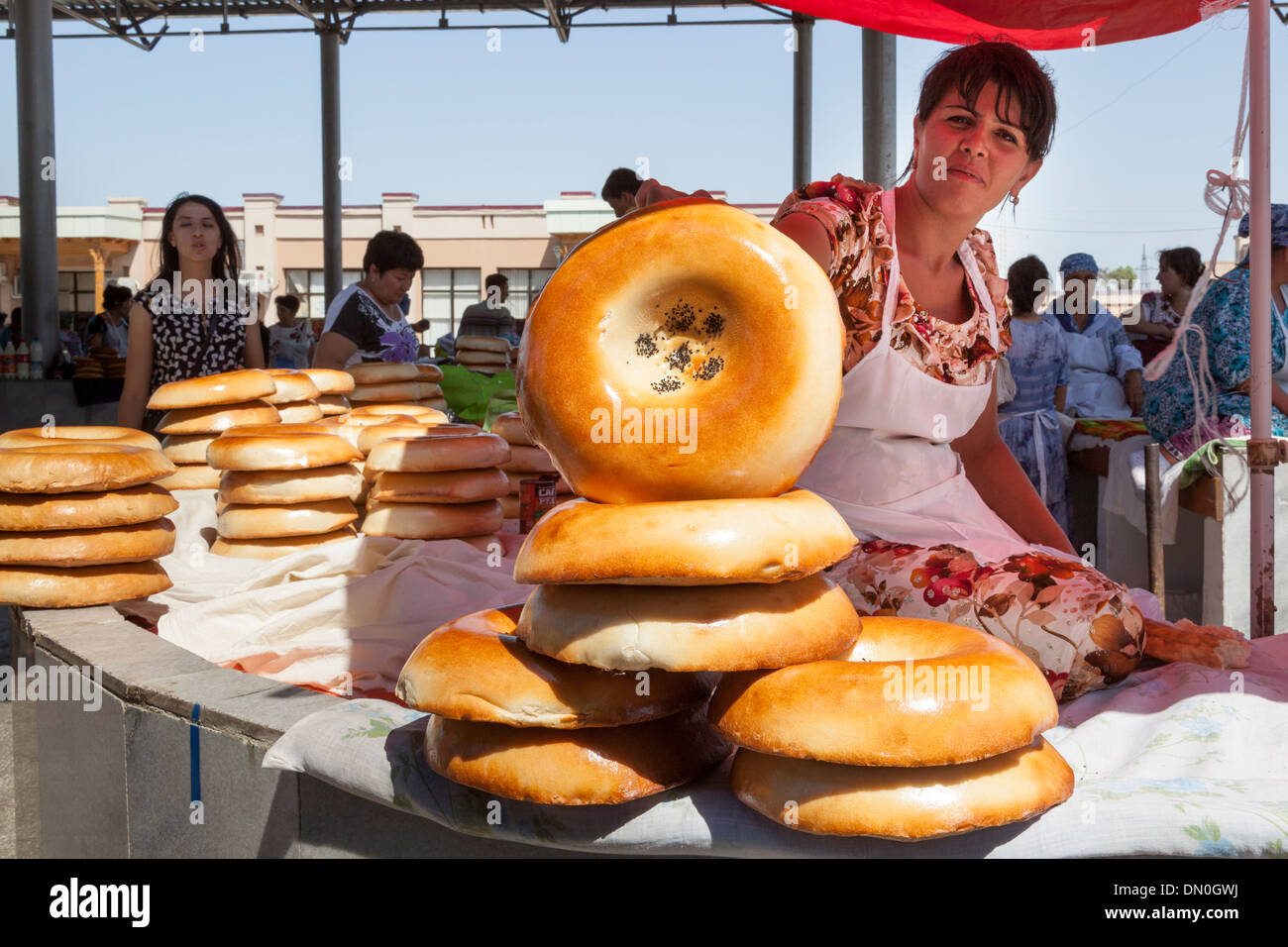 Woman selling non bread, Siyob Market, also known as Siab Market, Samarkand, Uzbekistan Stock Photo