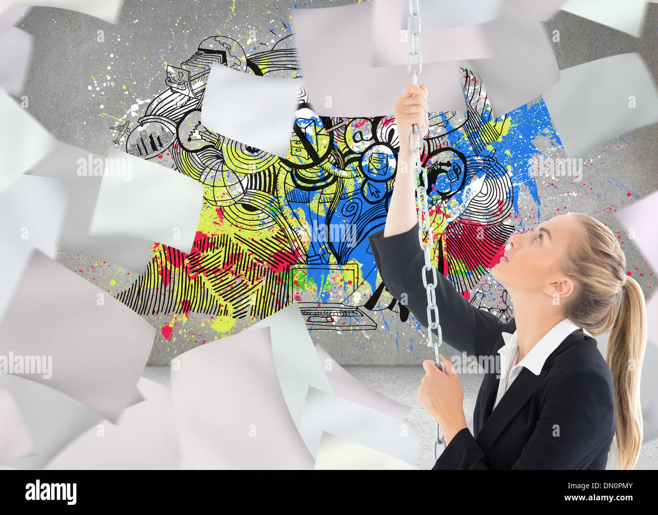 Composite image of businesswoman pulling a chain Stock Photo - Alamy