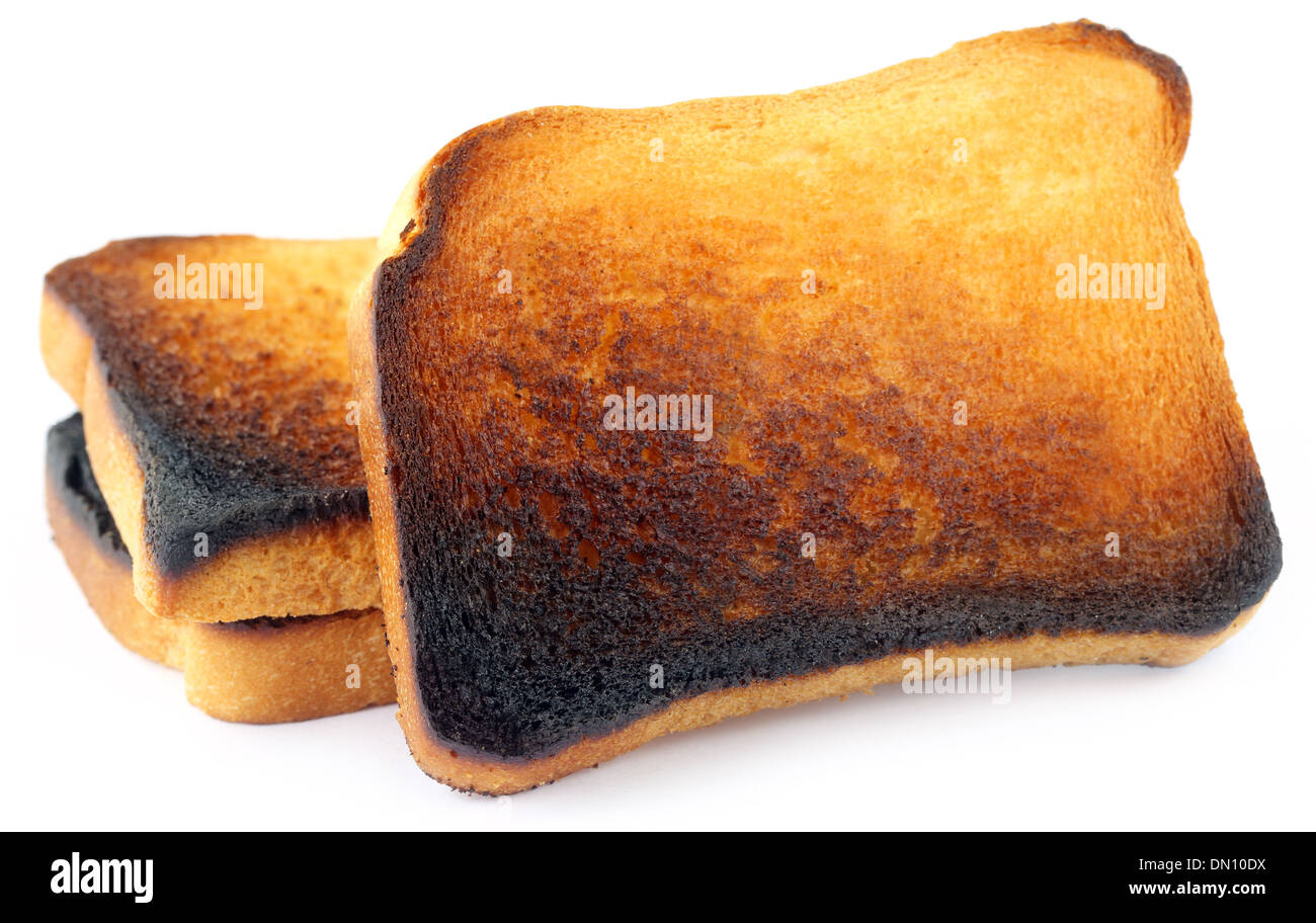 Burnt Toast over white background Stock Photo Alamy