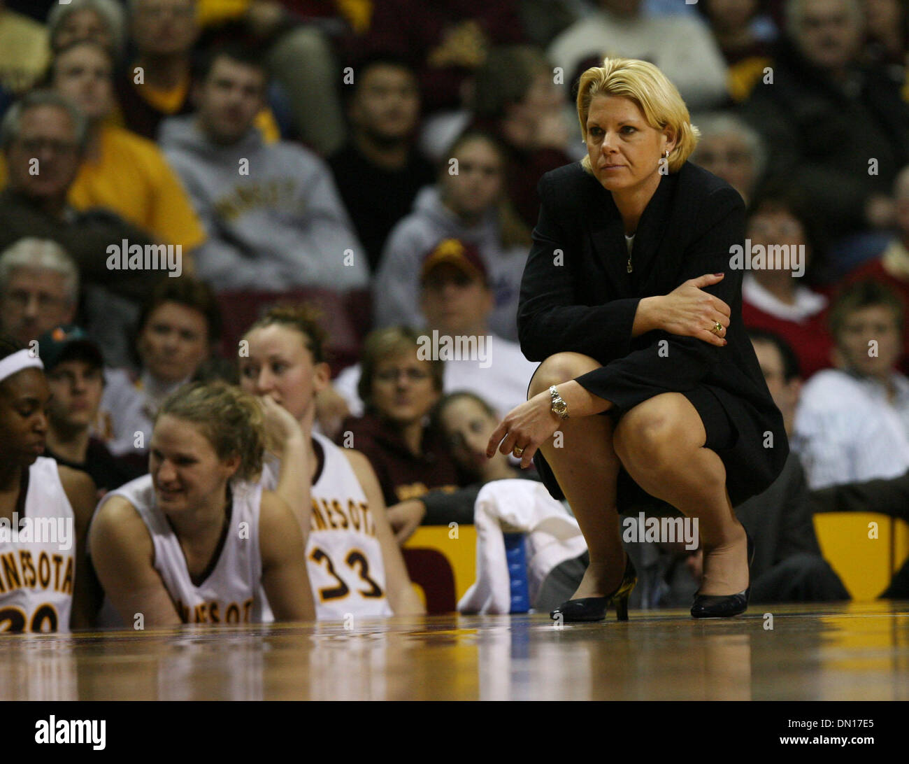 Dec 10, 2005; Minneapolis, MN, USA; Coach Pam Borton on the sidelines with three of the women who have left the program to her right:Jamie Broback (33), Liz Podominick and Natasha Williams (far left). Minnesota Gophers women during the Gophers 83-57 win Saturday, Dec. 10, 2005, at Williams Arena in Minneapolis.  Mandatory Credit: Photo by David Joles/ZUMA Press. (©) Copyright 2005  Stock Photo