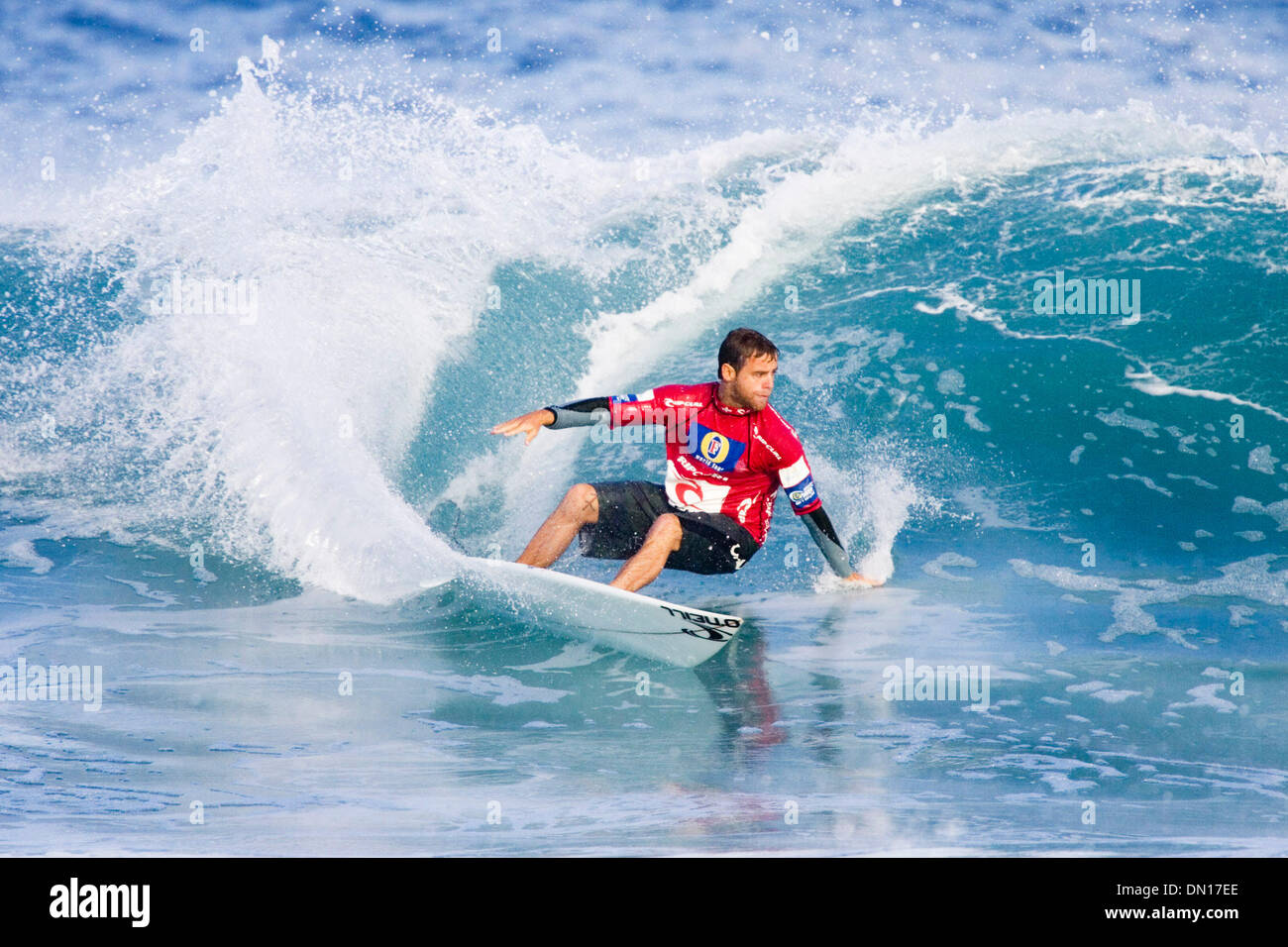 Dec 10, 2005; Pipeline, Oahu, Hawaii, USA; Current ASP world number six TRENT MUNRO (Scotts Head, NSW, Aus) scored a convincing win in round one at the Rip Curl Pro Pipeline Masters today. Munro was leagues ahead of Troy Brooks (Aus) and Shea Lopez (USA), and his careful wave selection in the tricky inconsistent conditions saw him advance directly to round three, skipping the loser Stock Photo