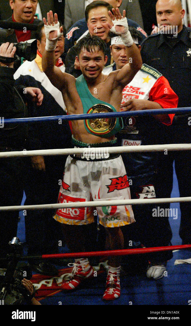 Jan 21, 2006; Las Vegas, NV, USA; MANNY PACQUIAO of the Philippines, celebrates after stopping Erik Morales in the 10th round to win the super featherweight boxing match Saturday night. Mandatory Credit: Photo by J.P. Yim/ZUMA Press. (©) Copyright 2006 by J. P. Yim Stock Photo