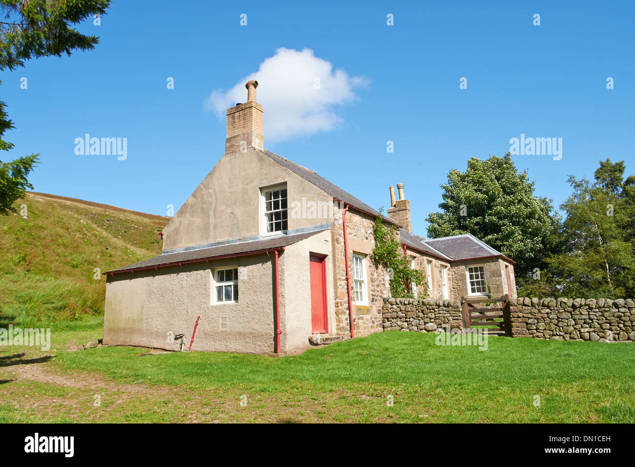 A farm house at langleeford hope in the Cheviot Hills in Stock Photo