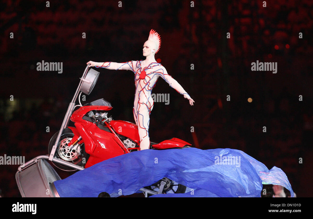 Feb 10, 2006; Turin, ITALY; Turin kicked off their 2006 Olympic games with an extravagant opening ceremony at the Olympic Stadium Friday night. Pictured: A dancer in the opening ceremony Friday night took a lap around the stadium astride an Italian motorcycle at the end of his performance. Mandatory Credit: Photo by Jeff Wheeler/Minneapolis Star T /ZUMA Press. (©) Copyright 2006 by Stock Photo