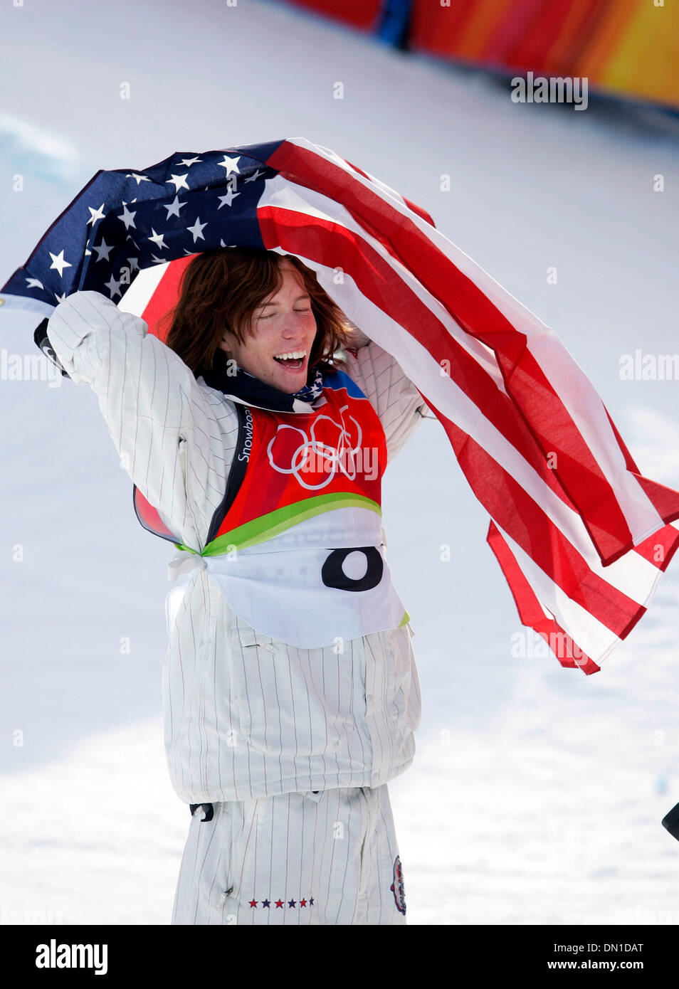 Feb 12, 2006; Bardonecchia, ITALY; XX Winter Olympics SHAUN WHITE of the US celebrates after winning a gold medal in the mens half pipe snowboarding competition at the Torino 2006 Winter Olympic