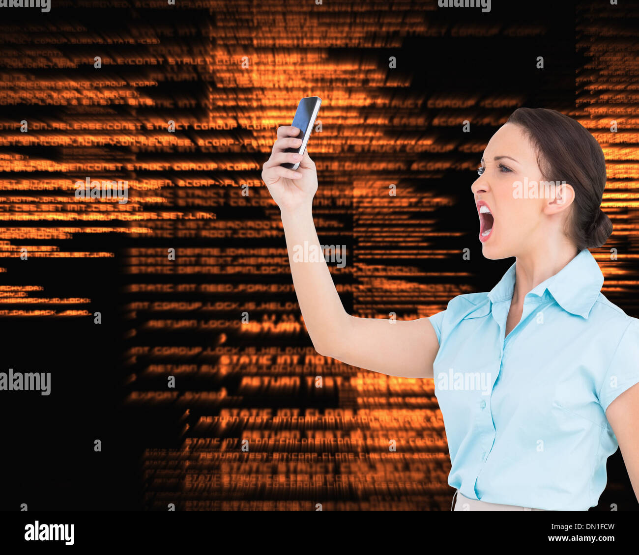 Composite image of angry classy businesswoman yelling at her smartphone Stock Photo