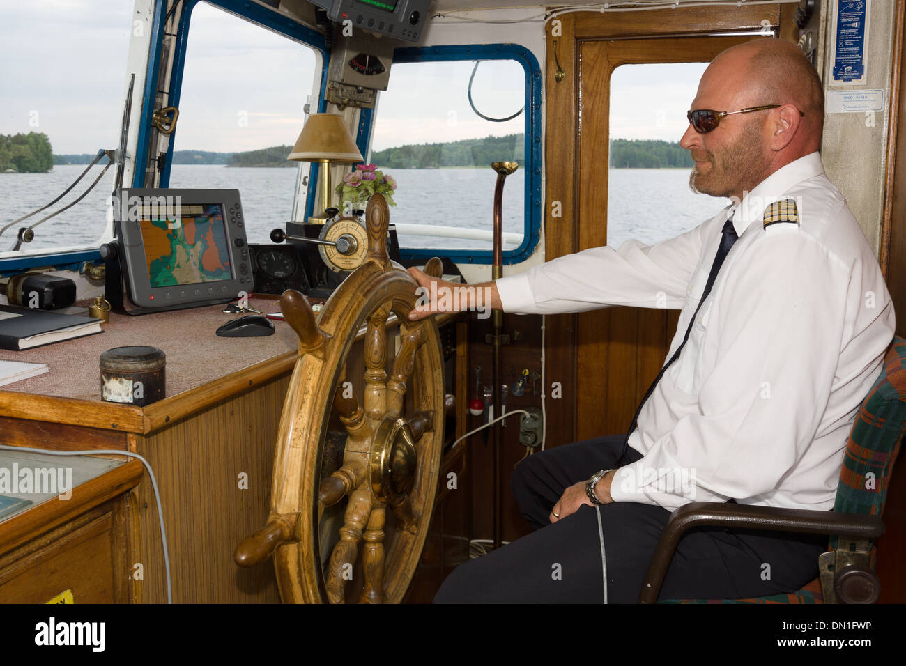 Pleasure boat captain. Lahti. Lake Vesijärvi. Stock Photo