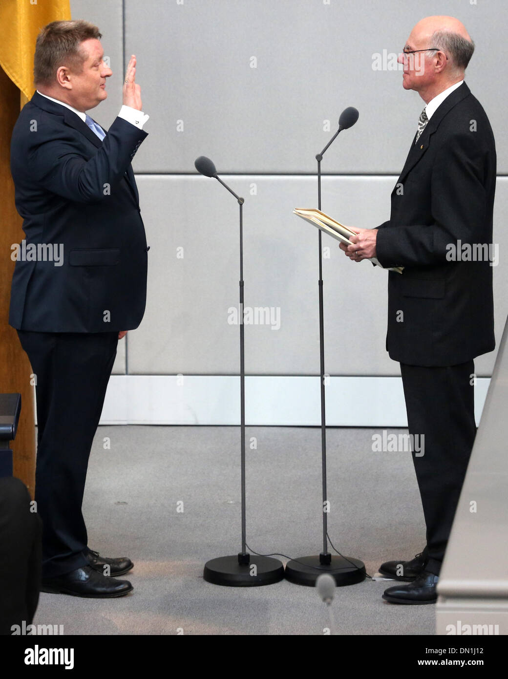 Berlin, Germany. 17th Dec, 2013. German Health Minister Hermann Groehe is sworn in by President of the 'Bundestag' lower house of the German Parliament Norbert Lammert (CDU) at Bundestag in Berlin, Germany, 17 December 2013. Merkel was elected to a third term as German Chancellor. Photo: HANNIBAL/dpa/Alamy Live News Stock Photo