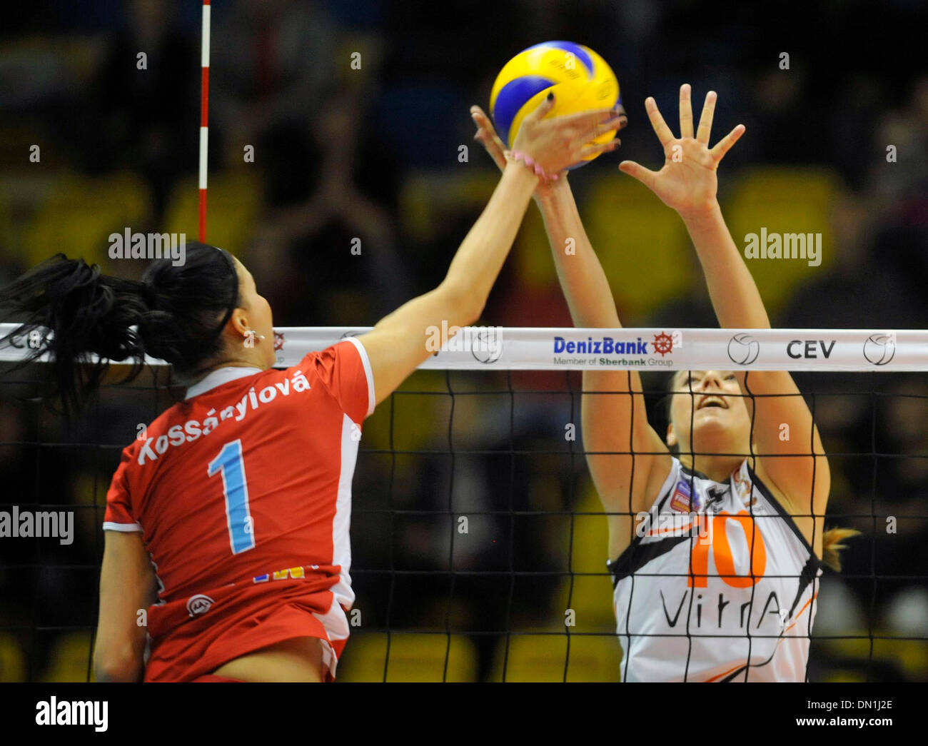 Andrea Kossanyiova of Prostejov, left, and Denise Hanke of Eczacibasi Istanbul pictured during the Women's Volleyball Champions League 6th round D group game played in Prostejov, Czech Republic, December 17, 2013. (CTK Photo/Ludek Perina) Stock Photo