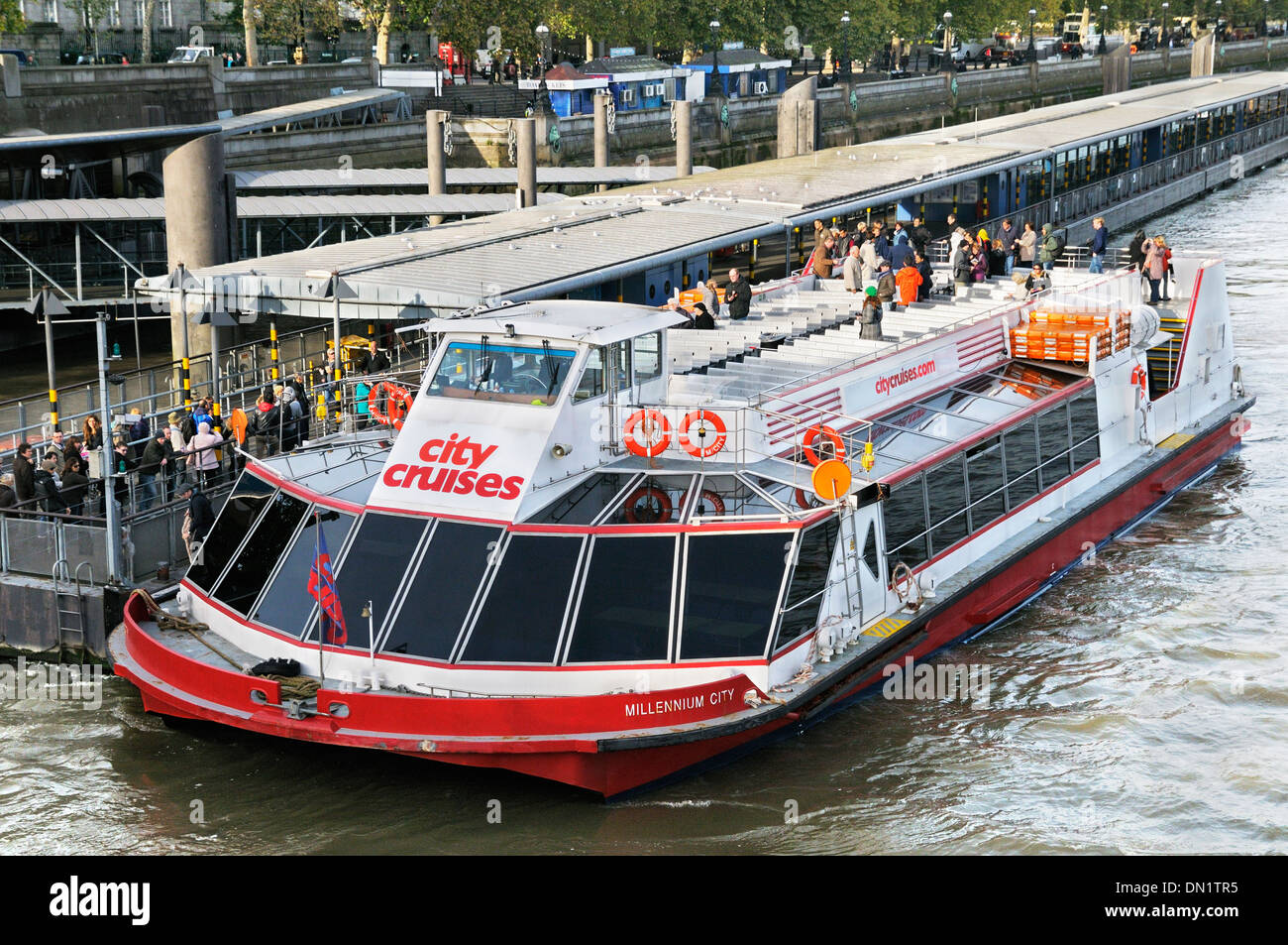 City Cruises boat on the River Thames, Victoria Embankment, London, England, UK Stock Photo