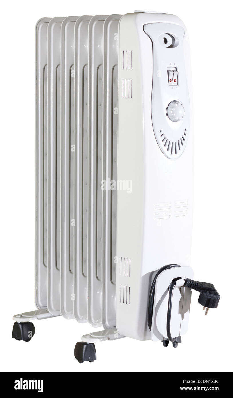 Isolated white oil radiator with thermostat and on-off switch and power plug on wheels Stock Photo