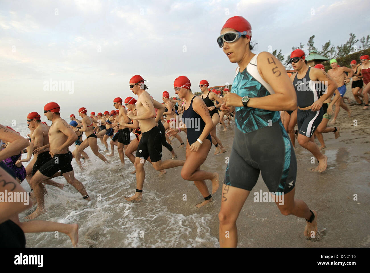 Apr 10, 2006; Boca Raton, FL, USA; Participants in the 2nd Wave enter the water during the 15th Annual Florida Atlantic University Wellness Triathlon in Spanish River Park Sunday morning. Mandatory Credit: Photo by Richard Graulich/Palm Beach Post/ZUMA Press. (©) Copyright 2006 by Palm Beach Post Stock Photo