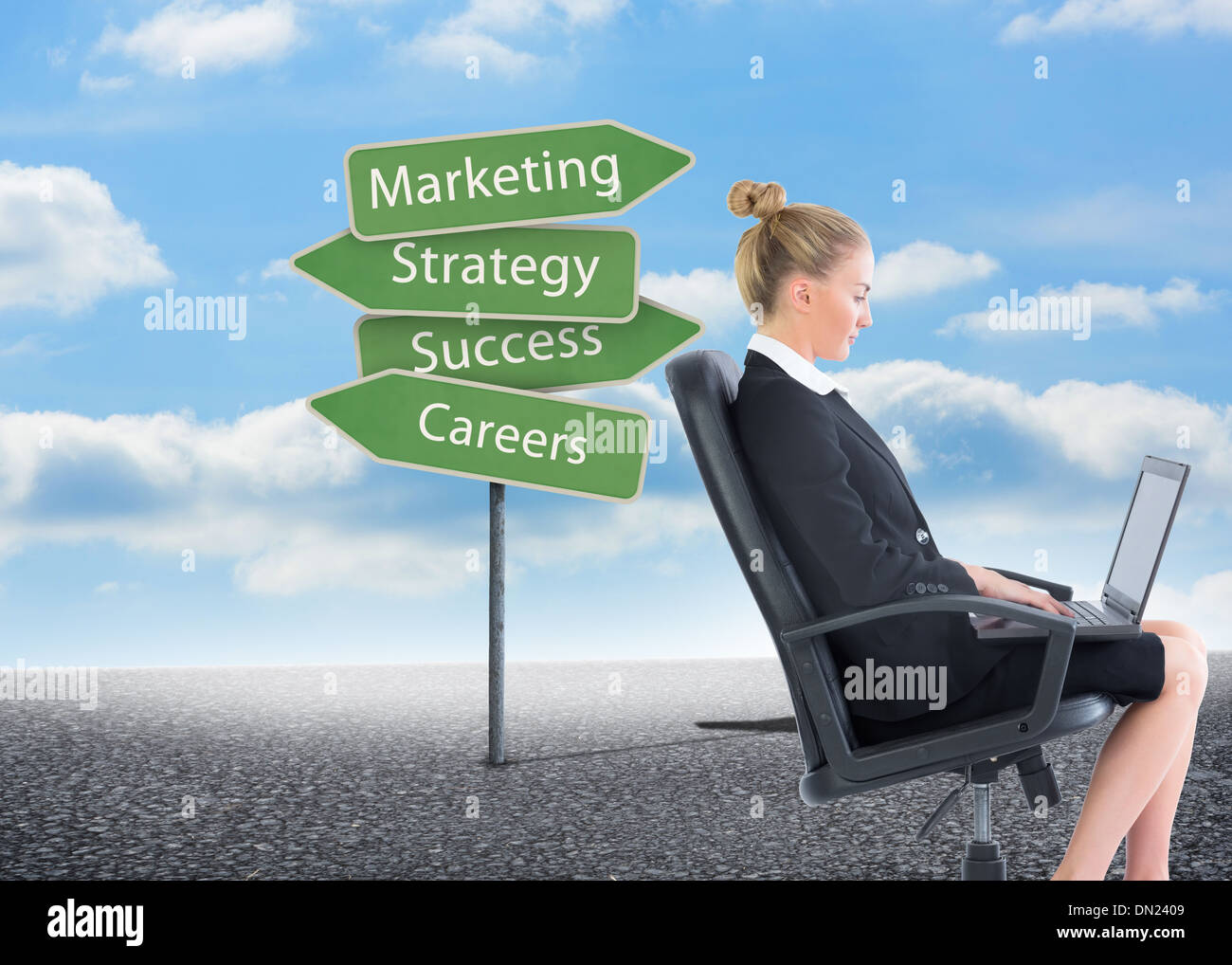 Composite image of businesswoman sitting on swivel chair with laptop Stock Photo