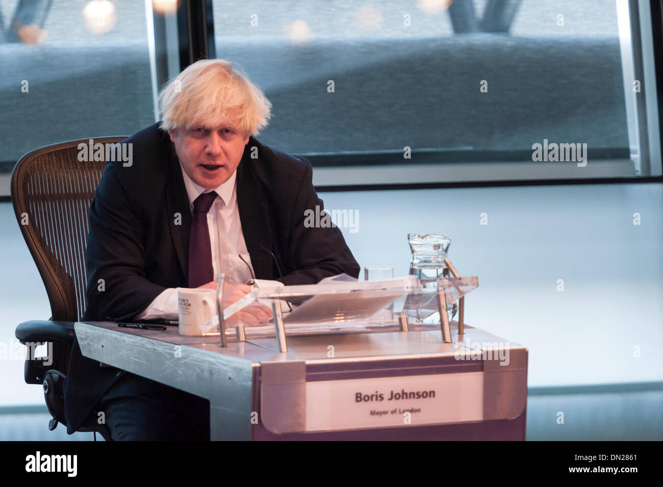 London, UK. 18th December, 2013. Boris Johnson attempted to answer questions on several issues at the Mayor's Question Time at City Hall, London, including safer cycling, fuel poverty, tackling FGM and his recent IQ test on LBC. Credit:  Lee Thomas/Alamy Live News Stock Photo