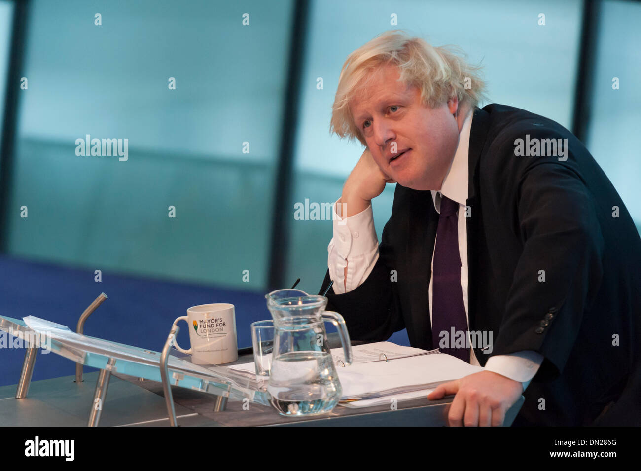 London, UK. 18th December, 2013. Boris Johnson attempted to answer questions on several issues at the Mayor's Question Time at City Hall, London, including safer cycling, fuel poverty, tackling FGM and his recent IQ test on LBC. Credit:  Lee Thomas/Alamy Live News Stock Photo