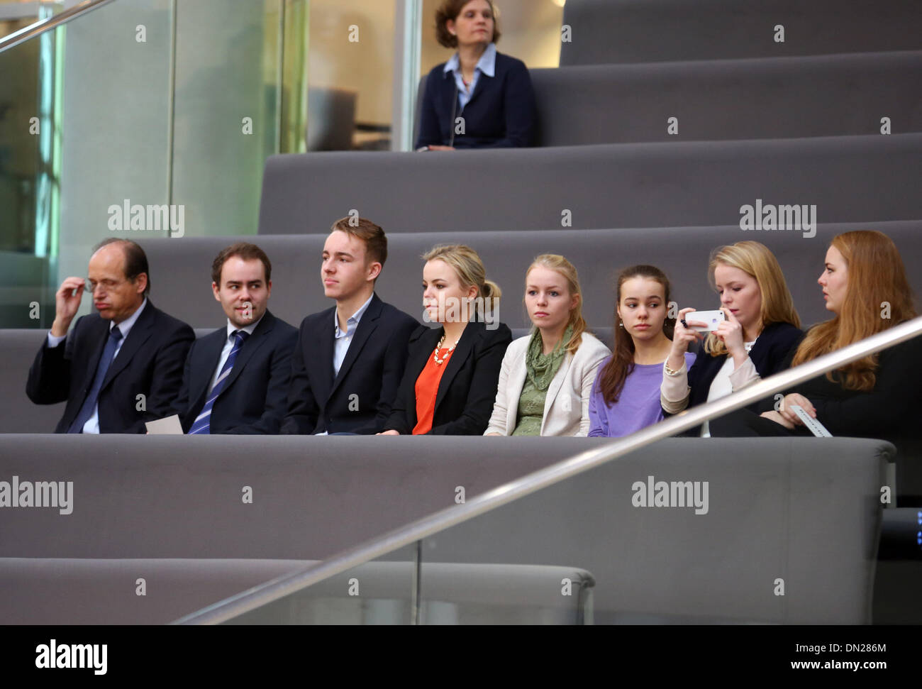 ATTENTION: THE PHOTO CAN ONLY BE USED IN CONNECTION WITH THE CURRENT REPORT ABOUT THE SWEARING IN OF VON DER LEYEN: THE USE OF THE PICTURE IN OTHER CONTEXTS IS NOT PERMITTED DUE TO PRIVACY REASONS. - The family of new German Defence Minister Ursula von der Leyen sits in the stands in the German Bundestag in Berlin, Germany, 17 December 2013. Husband Heiko von der Leyen, sons David and Egmont and daughters Sophie, Victoria, Gracia, Johanna and Donata. The election of the German Chancellor and the swearing in the new government will take place here. Photo: Hannibal/dpa Stock Photo