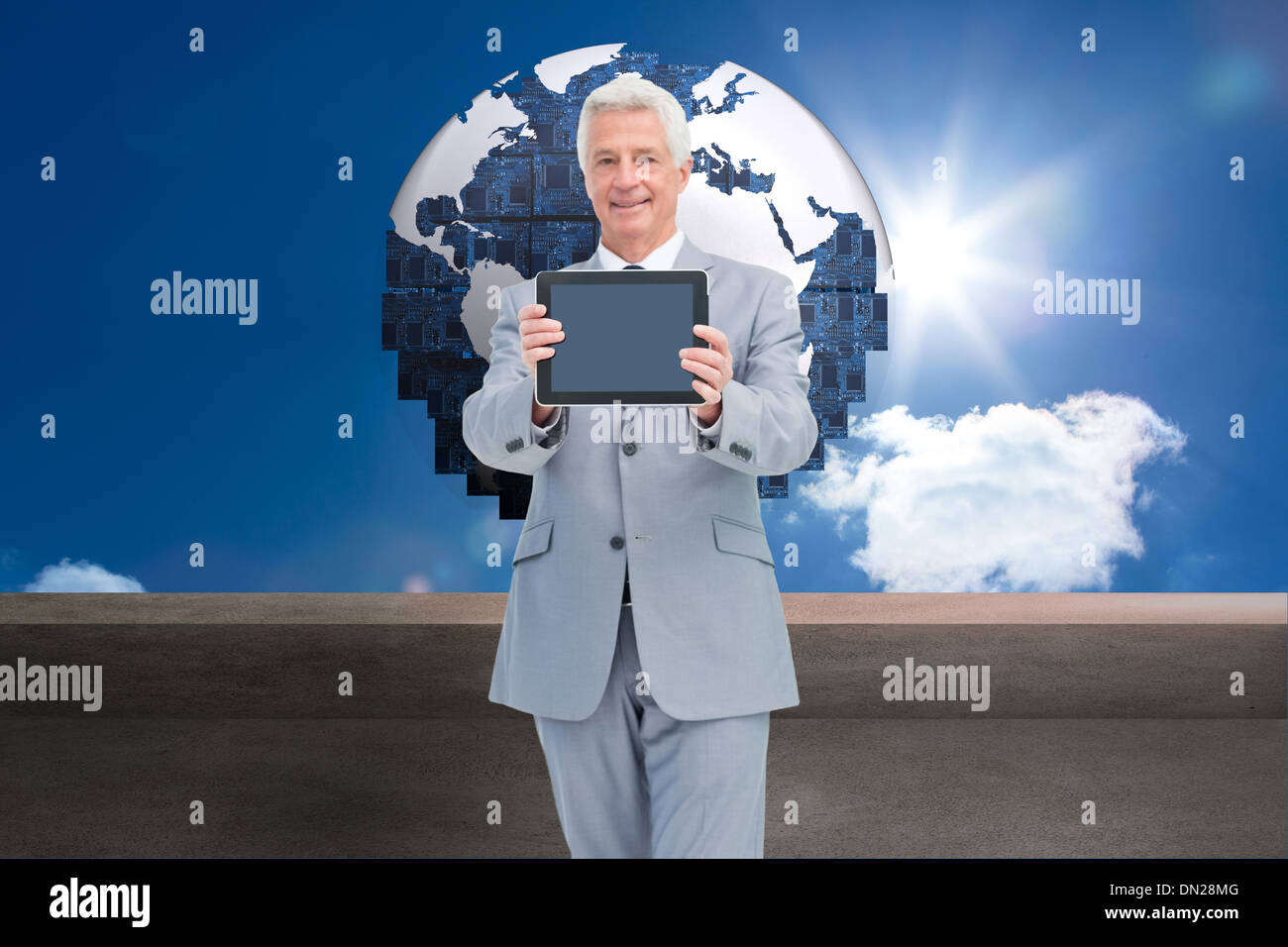 Composite image of boss showing a touch pad screen Stock Photo Alamy